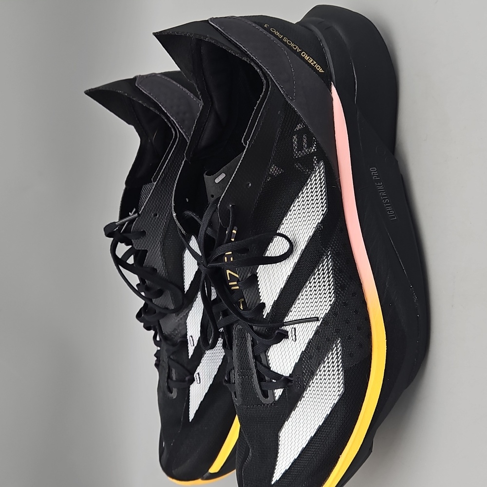 Adidas Black and White Athletic Shoes with Dynamic Design